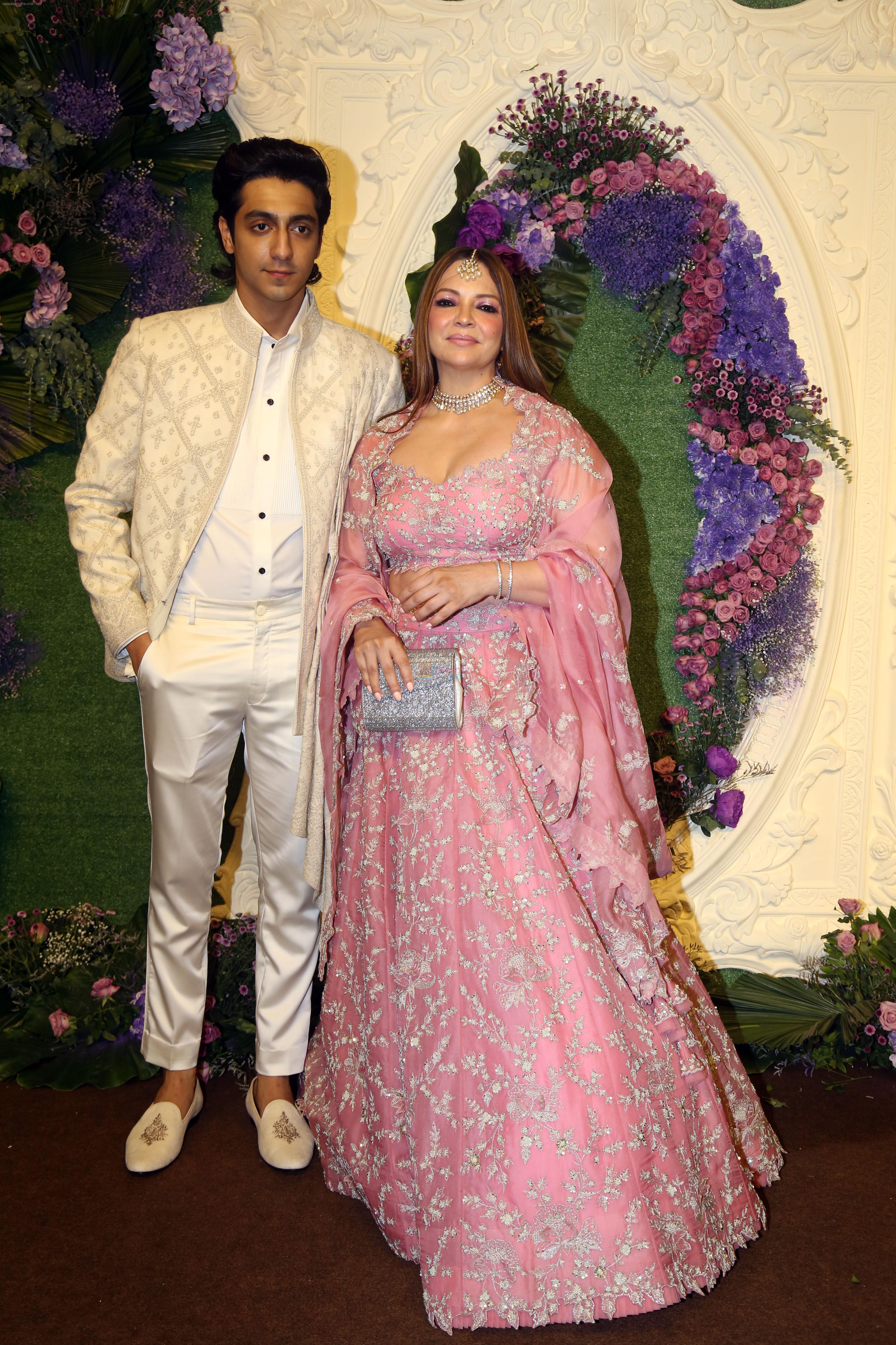 Deanne Panday with son Ahaan Panday Pose for media at the reception of Karan Deol and Drisha Acharya on 18 Jun 2023