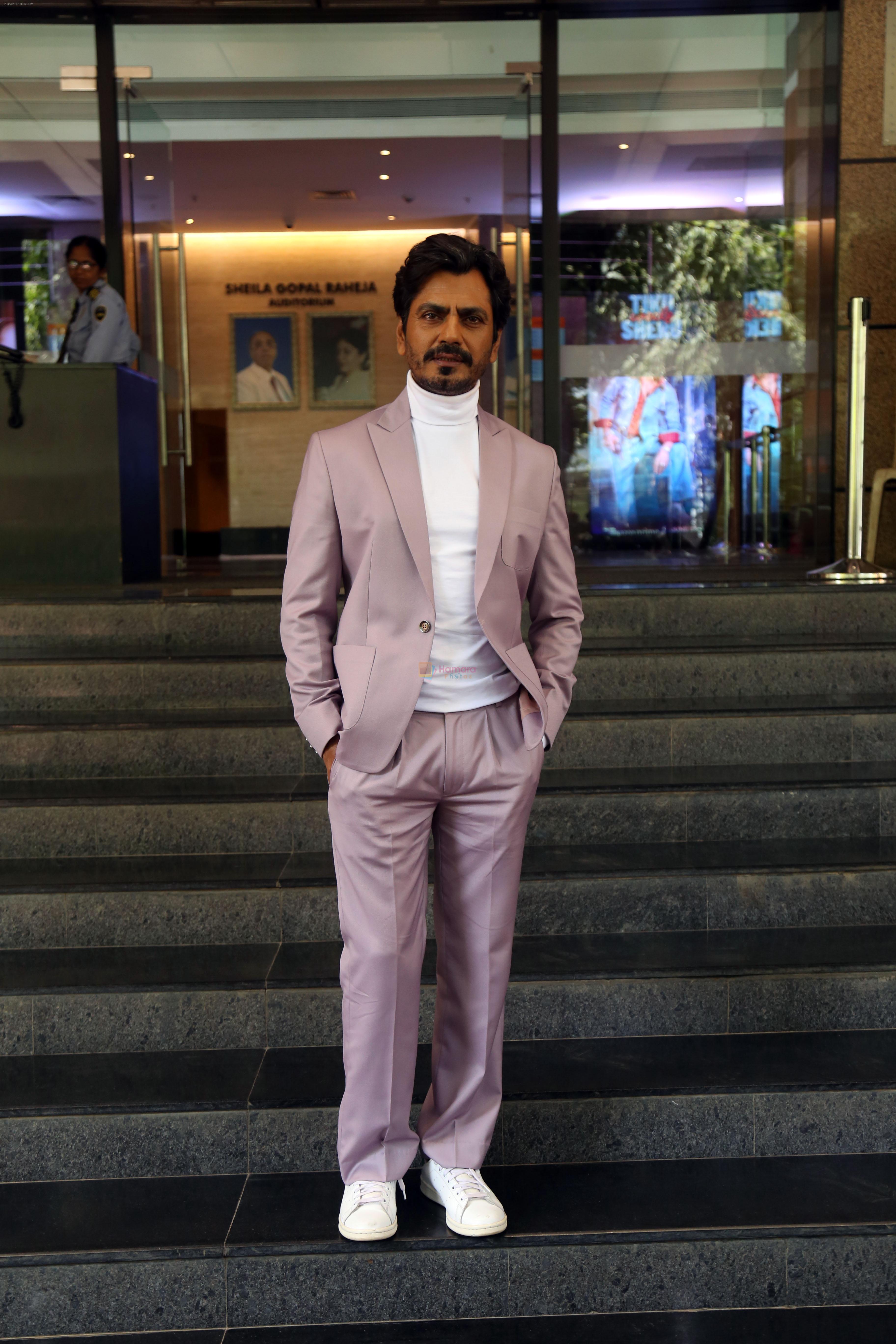 Nawazuddin Siddiqui pose to promote Tiku Weds Sheru at Rang Mandir in Bandra on 20 Jun 2023