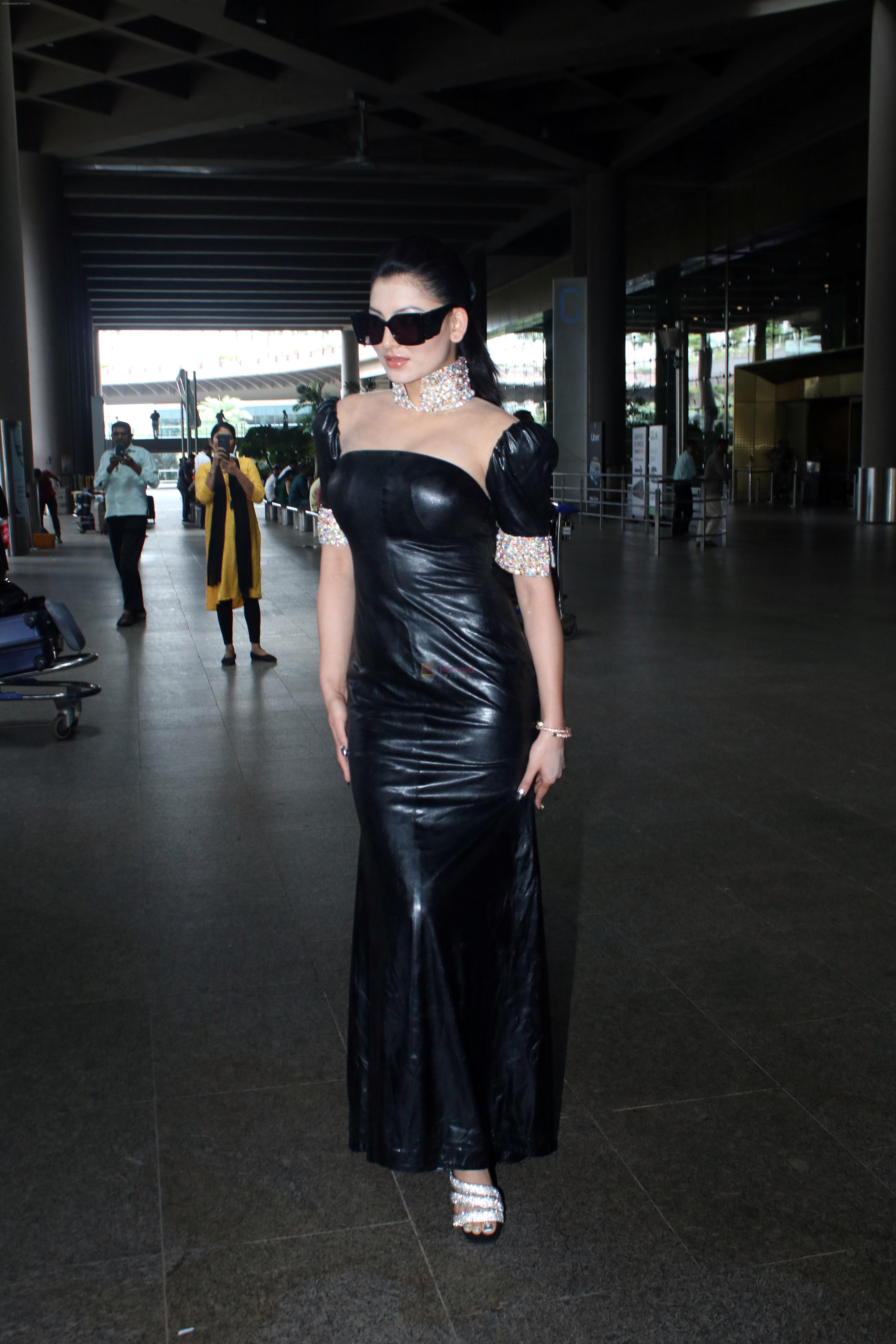 Urvashi Rautela dressed in Black seen at the airport on 13 July 2023