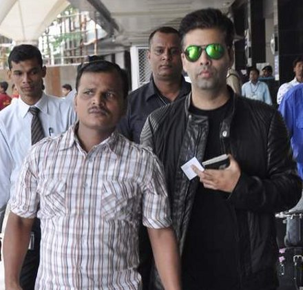 Karan Johar return from Durban in Mumbai Airport on 8th Sept 2013